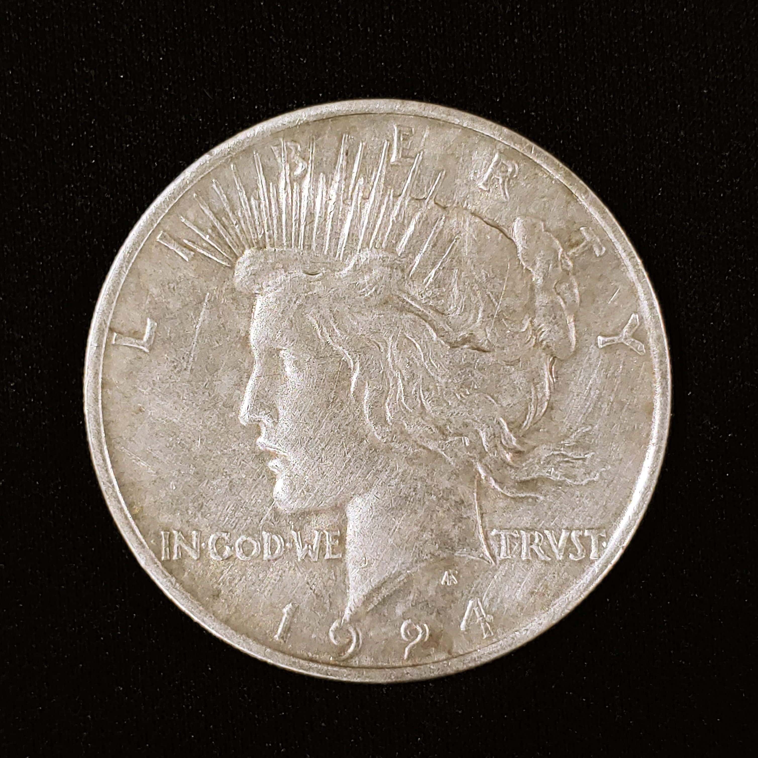 Obverse of Peace Dollar with 1924 Visible Along Lower Edge