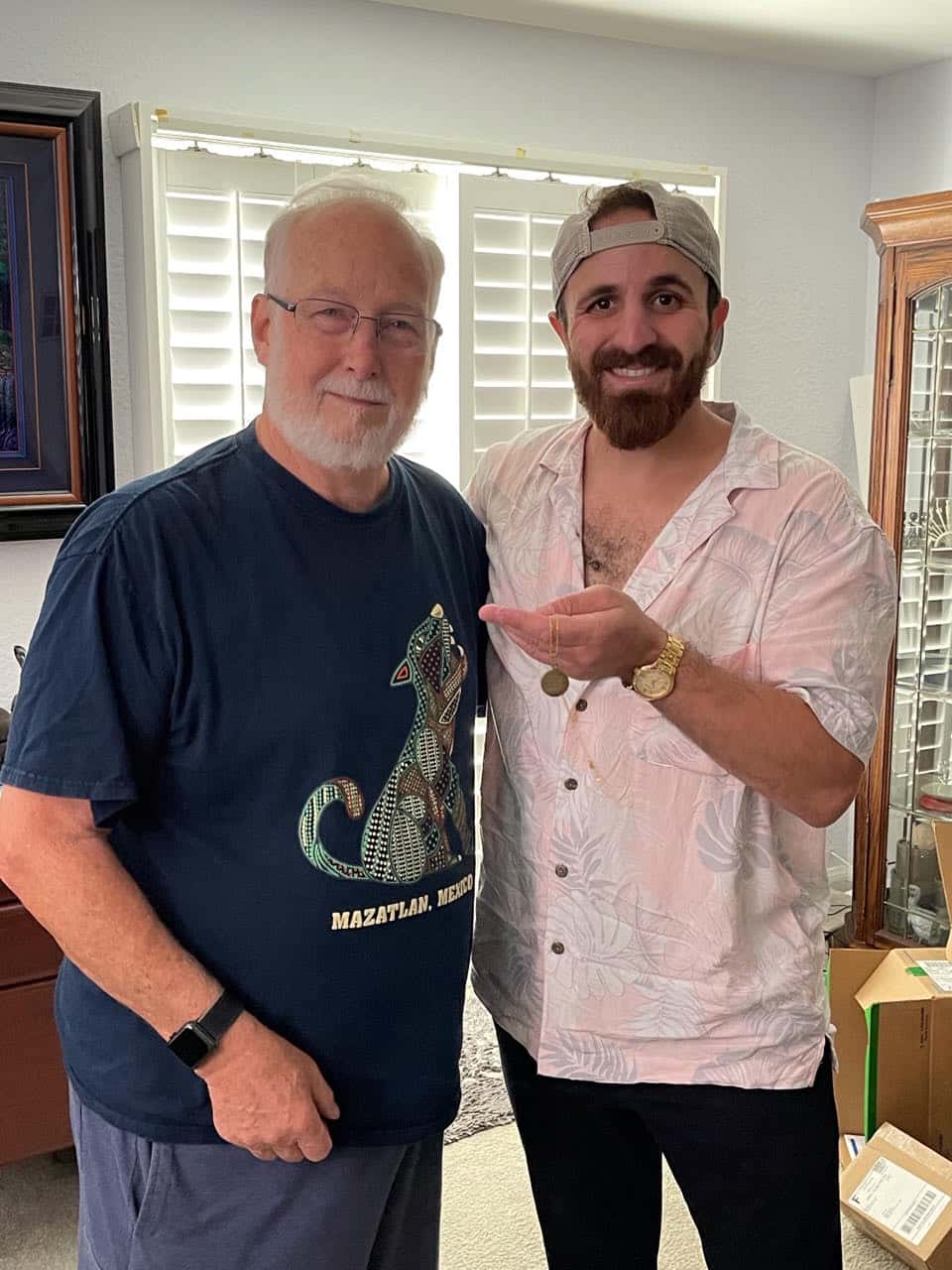 Farther Back View of Detectorist and Person Who Owns the Pendant Engraved with Dates and Last Name