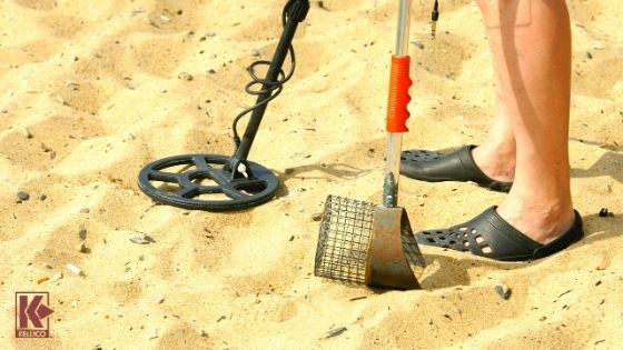 Metal detecting on the beach