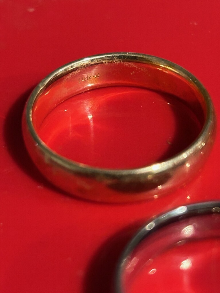 Image of Equinox 800 Metal Detector Hovering Over Icon Image of Gold Ring on White Background with Red Kellyco K Logo in Upper Left Corner